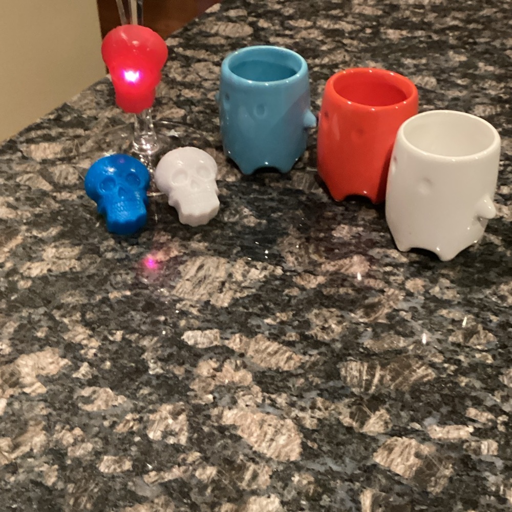 Colorful Ghost Shot Glasses and Lighted Skull Glass Markers.